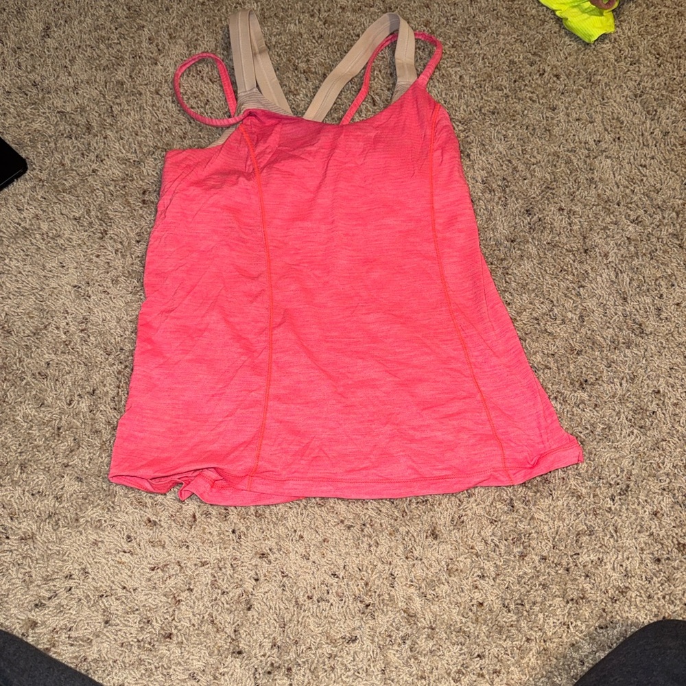 Lululemon pink tank top. Lined bra.